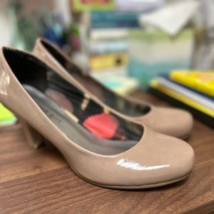 Beige patent pumps